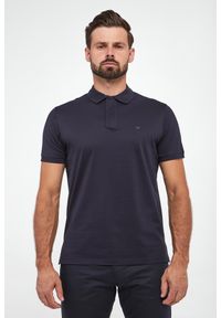 Emporio Armani - Polo męskie EMPORIO ARMANI. Typ kołnierza: polo