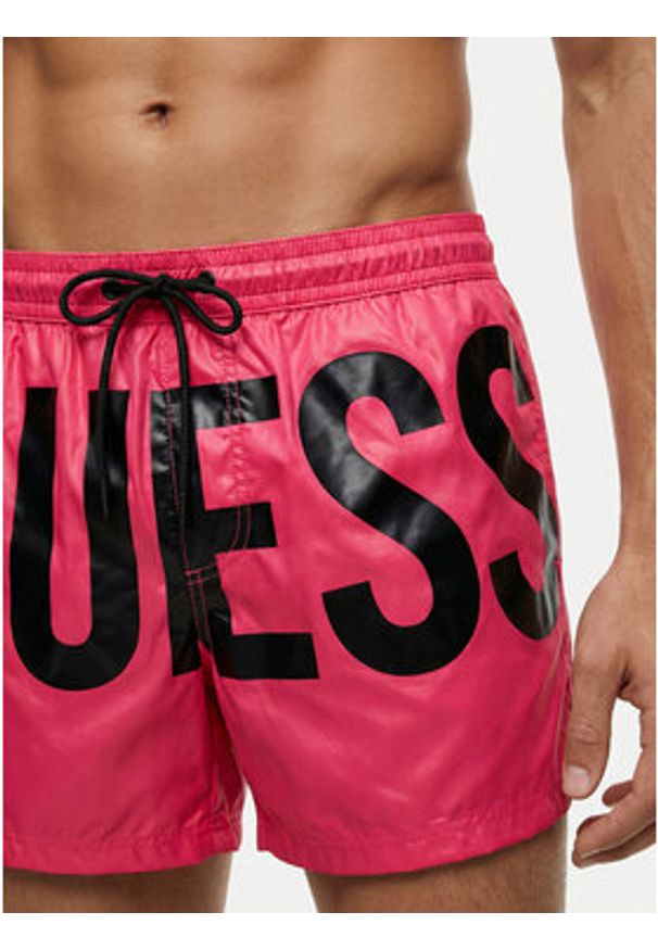 Guess Szorty kąpielowe F6GT03 WN322 Różowy Regular Fit. Kolor: różowy. Materiał: syntetyk