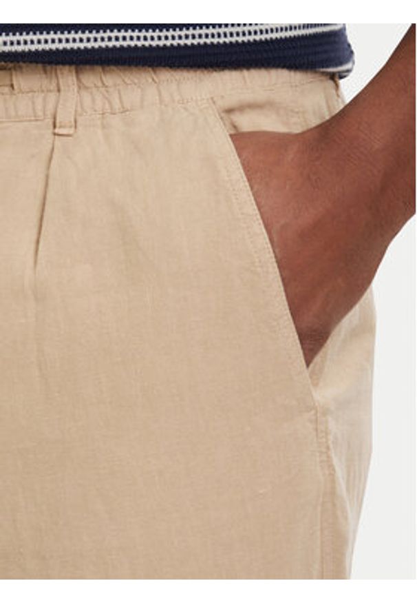 Polo Ralph Lauren Spodnie materiałowe 710940611010 Beżowy jasny Tapered Fit. Kolor: beżowy. Materiał: len