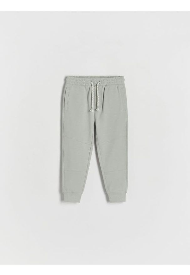 Reserved - Spodnie dresowe jogger - jasnoszary. Kolor: szary. Materiał: dresówka