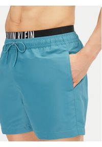 Calvin Klein Swimwear Szorty kąpielowe KM0KM01093 Niebieski Regular Fit. Kolor: niebieski. Materiał: syntetyk