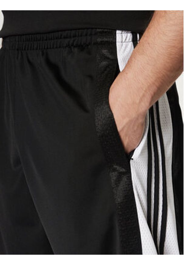 Adidas - adidas Spodnie dresowe Adibreak JD4267 Czarny Loose Fit. Kolor: czarny. Materiał: syntetyk