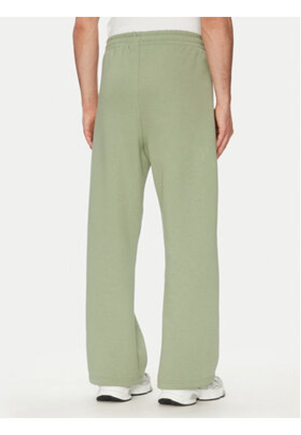 Karl Kani Spodnie dresowe Ellipse Straight Leg 60060043 Khaki Relaxed Fit. Kolor: brązowy. Materiał: bawełna