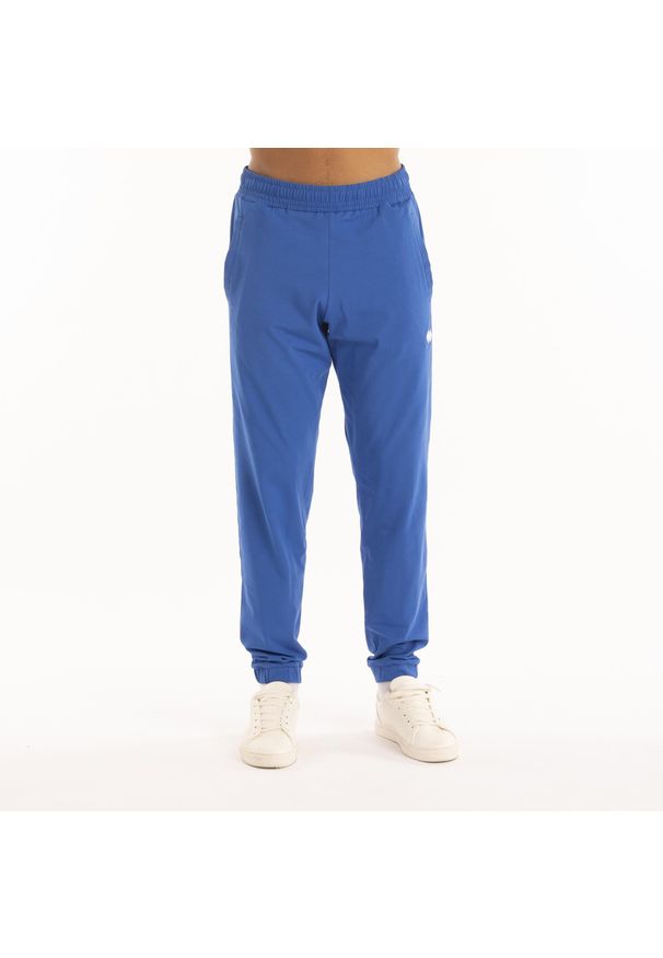 ERREA - Jogging Errea Essential 50. Kolor: niebieski. Materiał: dresówka. Sport: bieganie