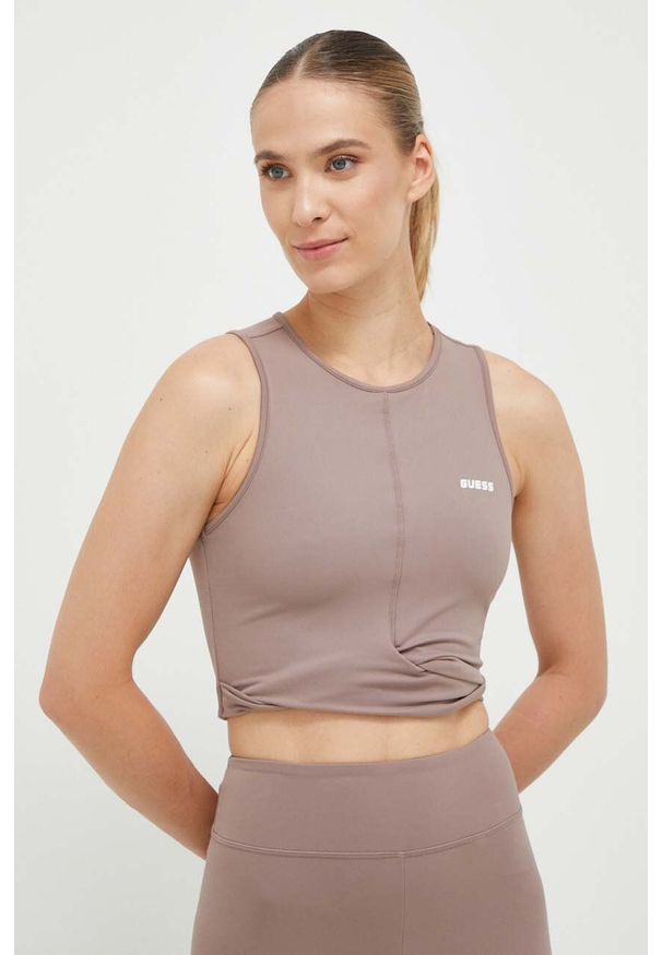 Guess top damski kolor brązowy. Kolor: brązowy. Materiał: dzianina. Styl: klasyczny