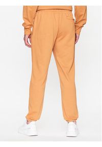 New Balance Spodnie dresowe MP31539 Żółty Regular Fit. Kolor: żółty. Materiał: bawełna #4
