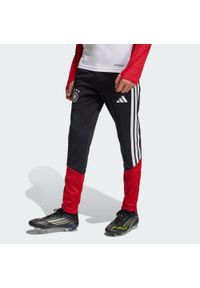 Adidas - Dziecięce spodnie treningowe Niemcy 26 Tiro. Kolor: czarny. Materiał: dresówka. Sport: piłka nożna #1