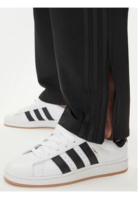 Adidas - adidas Spodnie dresowe adicolor Classics Firebird JY1350 Czarny Regular Fit. Kolor: czarny. Materiał: syntetyk #4