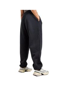 Spodnie damskie Nike Sportswear Phoenix Fleece Mid-Rise. Kolor: czarny