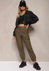 Renee - Ciemnozielone Zwężane Spodnie z Gumką w Pasie i Wsuwanymi Kieszeniami Lerana. Okazja: na spotkanie biznesowe, na co dzień. Kolor: zielony. Styl: casual, elegancki, biznesowy