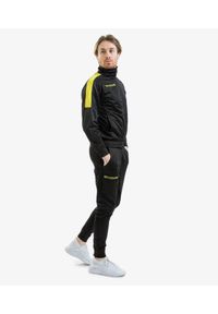 Givova Tuta Revolution Triacetato — dres 5XS. Kolor: czarny, żółty, wielokolorowy. Materiał: dresówka. Sport: piłka nożna