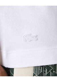 Lacoste - LACOSTE - Biała koszulka polo z logo Regular Fit. Typ kołnierza: polo. Kolor: biały. Materiał: bawełna, prążkowany. Wzór: aplikacja, haft. Styl: klasyczny #4