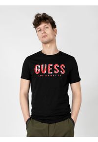Guess T-Shirty "Malco" | X2RI05KAK91 | Mężczyzna | Czarny. Kolor: czarny. Materiał: bawełna. Wzór: nadruk. Styl: klasyczny