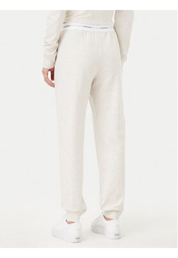 Calvin Klein Underwear Spodnie dresowe 000QS7271E Beżowy Regular Fit. Kolor: beżowy. Materiał: bawełna