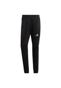 Adidas - Spodnie męskie adidas Essentials BrandLove French Terry. Kolor: biały, wielokolorowy, czarny. Materiał: polar. Sport: bieganie