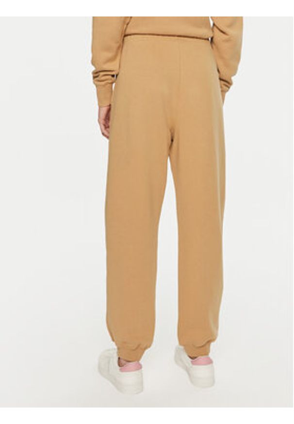 TOMMY HILFIGER - Tommy Hilfiger Spodnie dresowe WW0WW42883 Beżowy Regular Fit. Kolor: beżowy. Materiał: bawełna