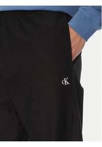 Calvin Klein Jeans Spodnie dresowe Premium LV04RC279G Czarny Regular Fit. Kolor: czarny. Materiał: bawełna #4