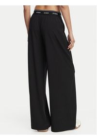 Guess Spodnie dresowe V6GB08 W1771 Czarny Relaxed Fit. Kolor: czarny. Materiał: syntetyk #3