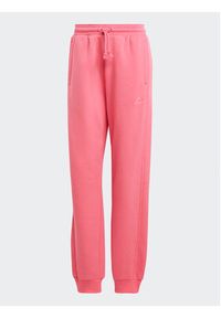 Adidas - adidas Spodnie dresowe ALL SZN Fleece IM0334 Różowy Loose Fit. Kolor: różowy. Materiał: bawełna #6