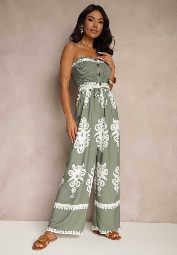 Renee - Ciemnobeżowy Kombinezon Bandeau Ozdobiony Ornamentnym Motywem i Guzikami Liravessa. Okazja: na co dzień. Kolor: beżowy. Wzór: aplikacja. Styl: elegancki, casual