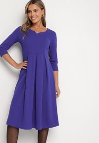 Born2be - Fioletowa Rozkloszowana Sukienka z Rękawem 3/4 Nomiel. Okazja: na spotkanie biznesowe. Typ kołnierza: dekolt w kształcie V. Kolor: fioletowy. Typ sukienki: rozkloszowane. Styl: klasyczny, elegancki, biznesowy #1