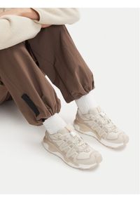 salomon - Salomon Sneakersy Xc Roam L49208200 Beżowy. Kolor: beżowy. Materiał: materiał #1