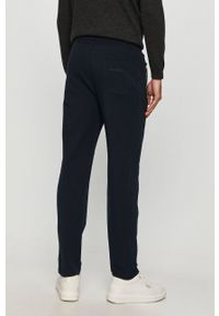Karl Lagerfeld - Spodnie. Kolor: niebieski. Materiał: bawełna, dzianina, elastan. Wzór: nadruk #2