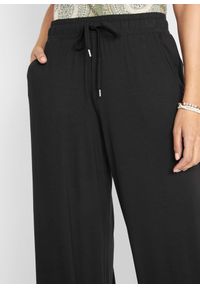 bonprix - Spodnie z dżerseju z lejącej mieszanki wiskozy. Kolor: czarny. Materiał: jersey, wiskoza #2