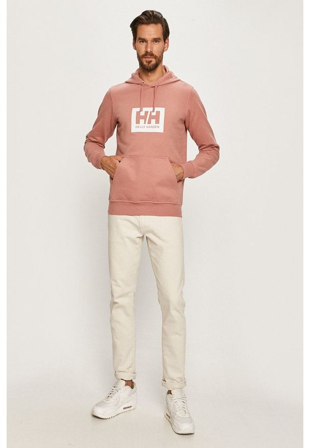 Helly Hansen Bluza bawełniana kolor różowy z kapturem z nadrukiem. Okazja: na co dzień. Typ kołnierza: kaptur. Kolor: różowy. Materiał: bawełna. Wzór: nadruk. Styl: casual