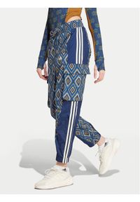 Adidas - adidas Spodnie dresowe FARM Rio Premium IV9760 Granatowy Loose Fit. Kolor: niebieski. Materiał: syntetyk