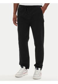 Tommy Jeans Joggery DM0DM22819 Czarny Tapered Fit. Kolor: czarny. Materiał: bawełna #1