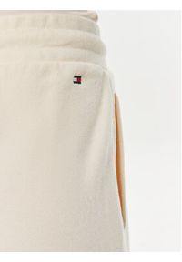 TOMMY HILFIGER - Tommy Hilfiger Spodnie dresowe Monotype WW0WW41572 Beżowy Regular Fit. Kolor: beżowy. Materiał: bawełna