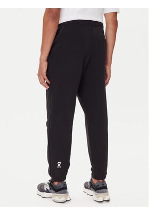 On Spodnie dresowe Club Pants 1ME1004 Czarny Relaxed Fit. Kolor: czarny. Materiał: bawełna