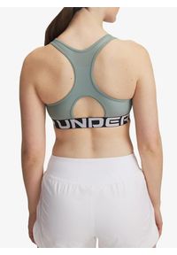 Stanik sportowy Under Armour HeatGear Authentics Mid Branded Bra. Kolor: zielony
