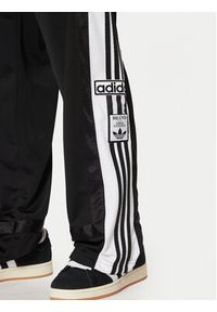 Adidas - adidas Spodnie dresowe Adibreak JD4267 Czarny Loose Fit. Kolor: czarny. Materiał: syntetyk #5