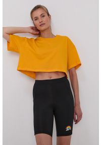 Reebok - T-shirt bawełniany. Kolor: żółty. Materiał: bawełna. Wzór: gładki