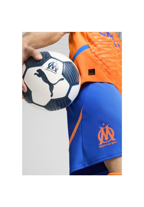Puma - Męskie szorty Olympique Marsylia 24/25 PUMA Racing Blue Fluro Orange Pes. Kolor: żółty, niebieski, wielokolorowy, pomarańczowy. Sport: piłka nożna