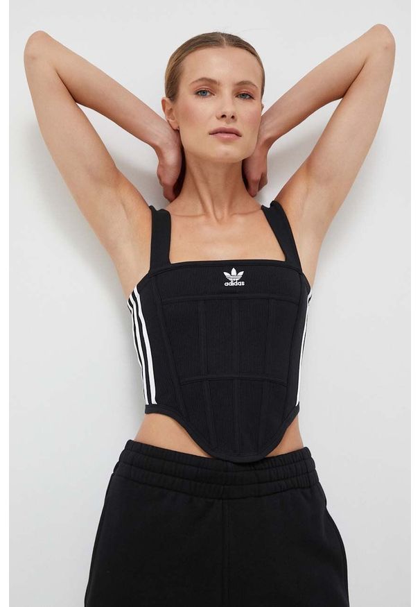 adidas Originals top damski kolor czarny. Typ kołnierza: dekolt w karo. Kolor: czarny. Materiał: skóra. Długość rękawa: na ramiączkach