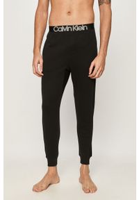 Calvin Klein Underwear - Spodnie piżamowe. Kolor: czarny. Materiał: bawełna, dzianina, elastan. Wzór: nadruk #1