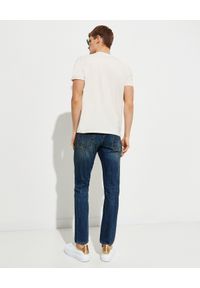 Alexander McQueen - ALEXANDER MCQUEEN - Granatowe jeansy z przetarciami. Kolor: niebieski #5