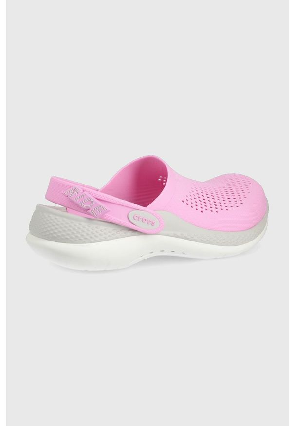 Crocs klapki damskie kolor różowy. Nosek buta: okrągły. Kolor: różowy. Materiał: materiał. Wzór: gładki. Obcas: na obcasie. Wysokość obcasa: niski