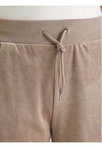 Guess Spodnie dresowe V3BB26 K0232 Beżowy Regular Fit. Kolor: beżowy. Materiał: syntetyk #3