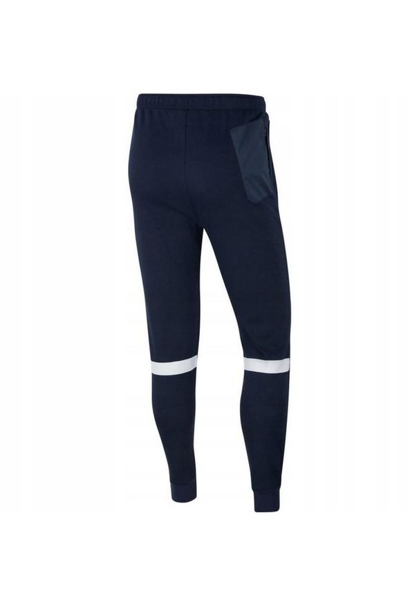 Nike - Męskie Spodnie Do Biegania Strike 21 Fleece. Kolor: niebieski. Materiał: dresówka
