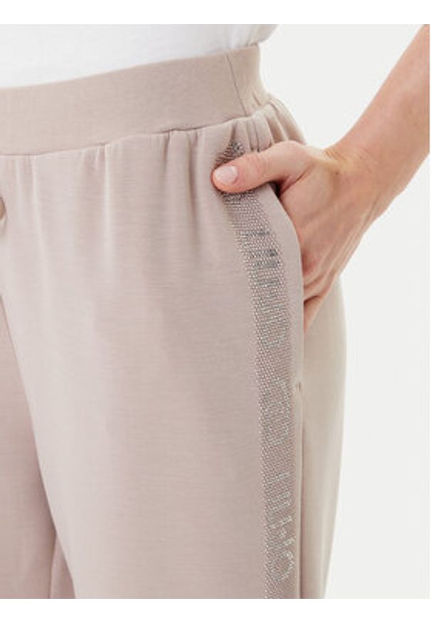 Liu Jo Spodnie dresowe TF5093 J4616 Beżowy Regular Fit. Kolor: beżowy. Materiał: syntetyk