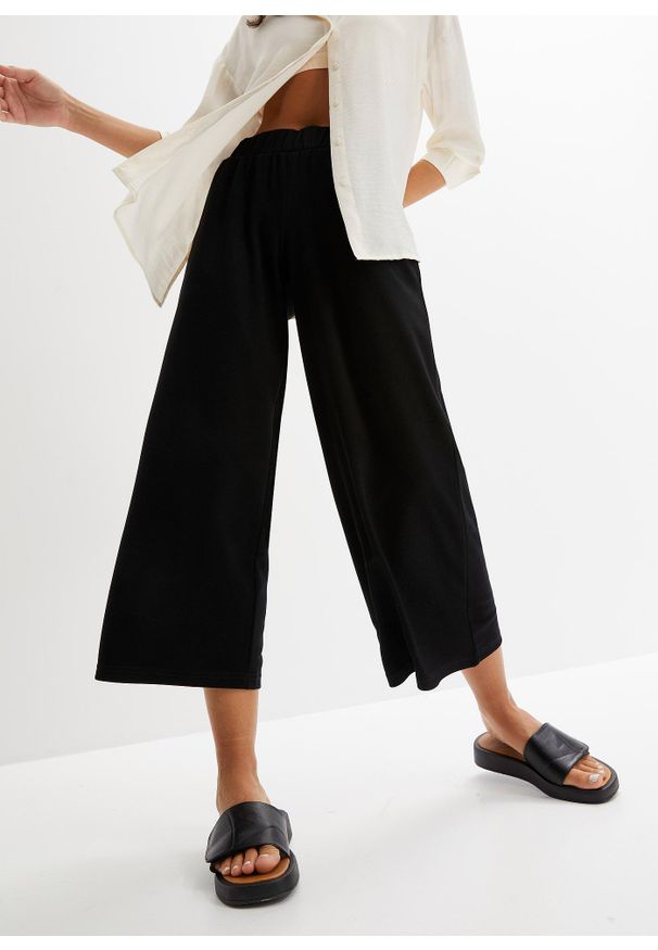 bonprix - Spodnie z dżerseju z elastyczną gumką w talii. Kolor: czarny. Materiał: jersey