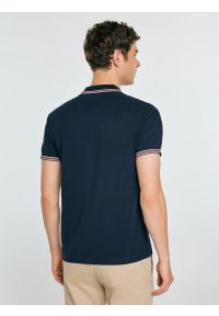 Big-Star - Koszulka męska polo z kontrastowym wykoŅczeniem granatowa Polos 403. Okazja: na co dzień, na spotkanie biznesowe. Typ kołnierza: polo. Kolor: niebieski. Materiał: dzianina. Wzór: nadruk, ze splotem. Styl: casual, biznesowy, elegancki #5