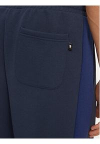 New Balance Spodnie dresowe MP43522NNY Niebieski Relaxed Fit. Kolor: niebieski. Materiał: syntetyk, bawełna #3