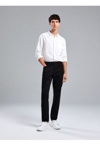 Sinsay - Spodnie jeansowe slim - czarny. Kolor: czarny #1