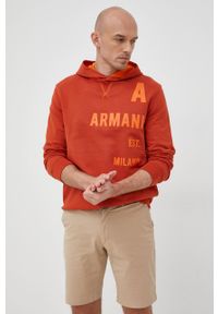 Armani Exchange bluza męska kolor pomarańczowy z kapturem z nadrukiem. Okazja: na co dzień. Typ kołnierza: kaptur. Kolor: pomarańczowy. Materiał: włókno. Wzór: nadruk. Styl: casual