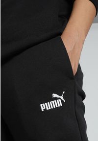Puma - Damskie spodnie dresowe z małym logo No.1 ESS PUMA Black. Kolor: czarny. Materiał: dresówka